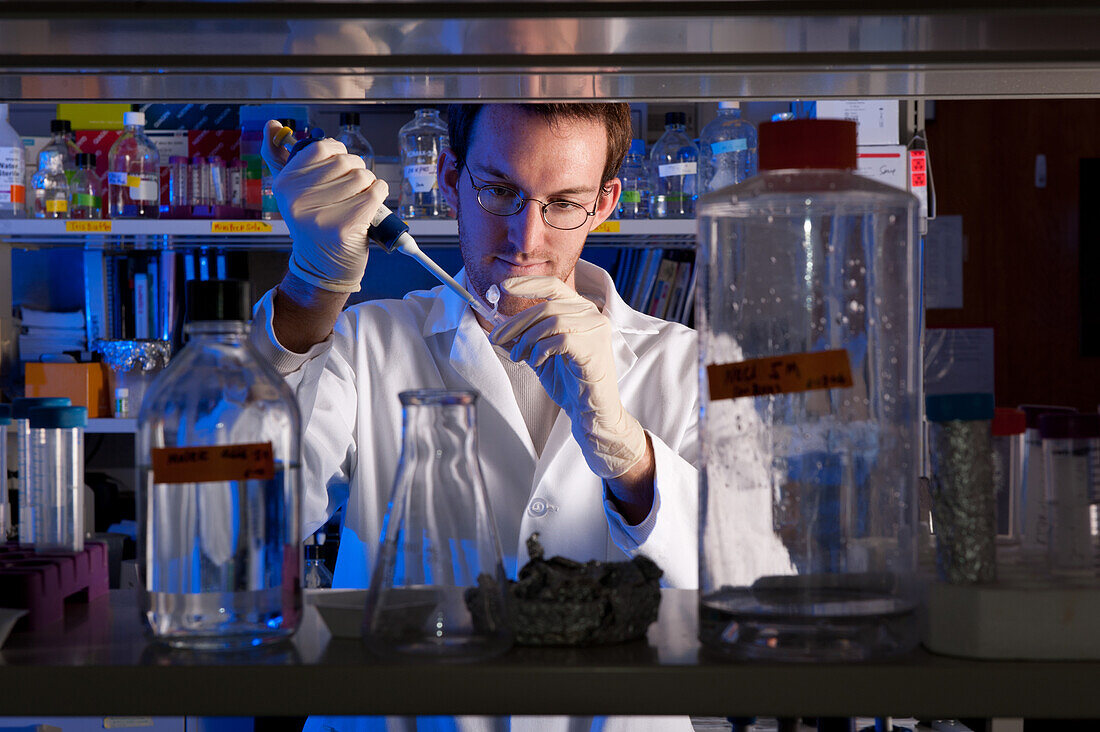 Scientist conducting experiment in lab