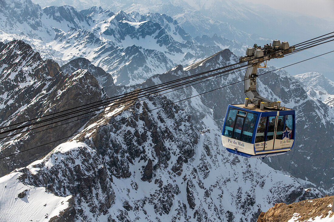 A cable car rising to The Observatory Of Pic Du Midi De Bigorre, Hautes Pyrenees, Midi Pyrenees, France
