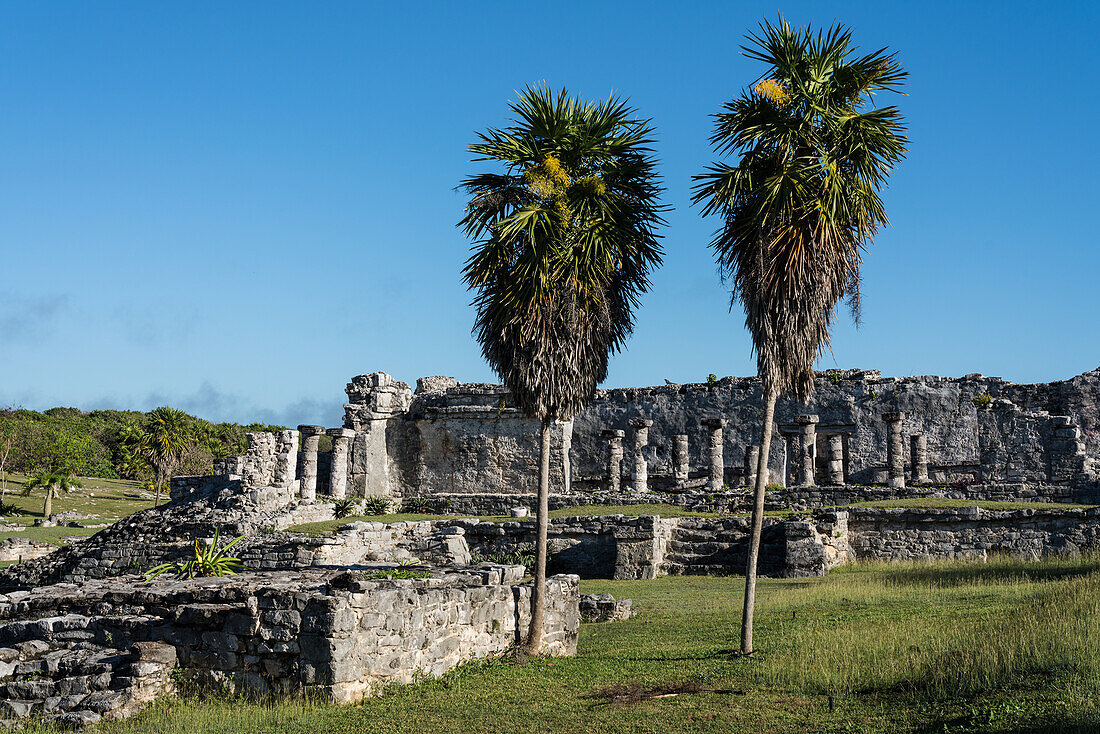 The House of the Columns in the ruins of the Mayan city of Tulum on the coast of the Caribbean Sea. Tulum National Park, Quintana Roo, Mexico.