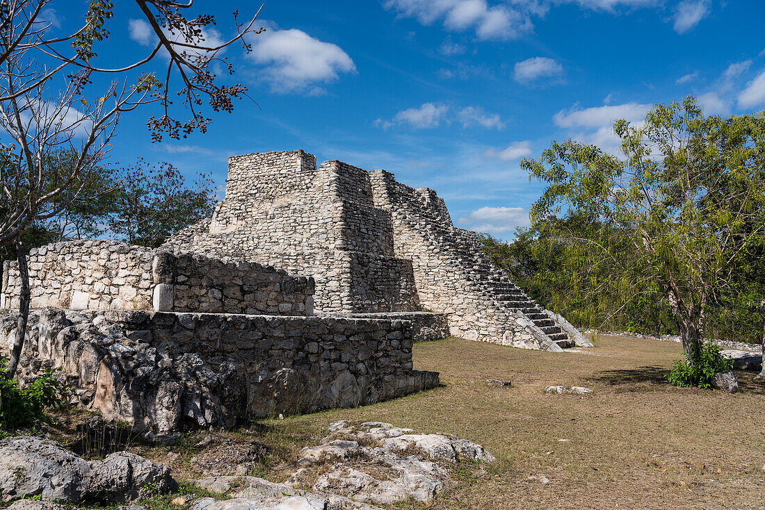 A altar and a stepped pyramid in the ruins of the Post-Classic Mayan city of Mayapan, Yucatan, Mexico.