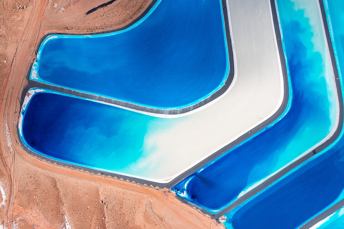 Evaporation ponds at a potash mine using a solution mining method for extracting potash near Moab, Utah. Blue dye is added to speed up evaporation.