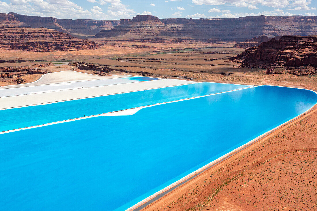 Evaporation ponds at a potash mine using a solution mining method for extracting potash near Moab, Utah. Blue dye is added to speed up evaporation.