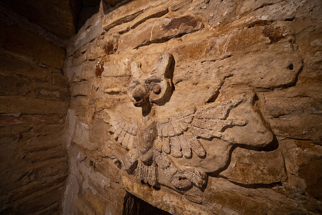 Stucco frieze figure of an owl inside Tomb 1, the crypt of Lord Nine Flower, at the ruins of the Zapotec city of Zaachila in the Central Valley of Oaxaca, Mexico.