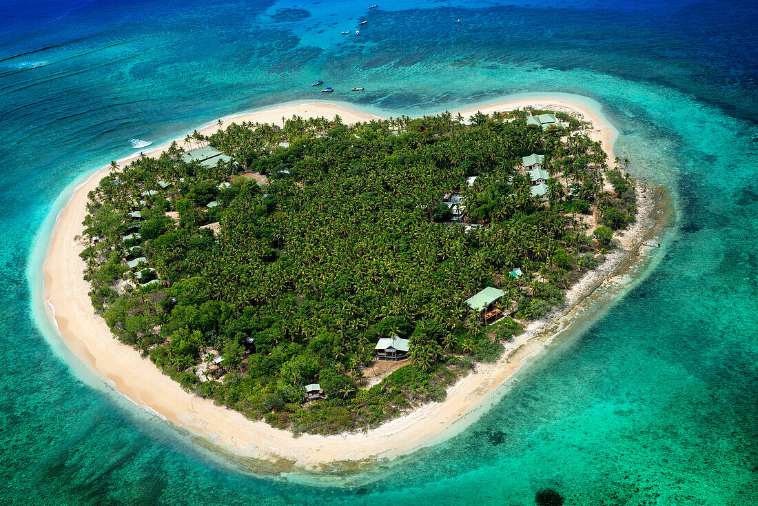 Aerial view of the heart-shaped island of Tavarua, near Viti Levu, Republic of Fiji, South Pacific Islands, Pacific