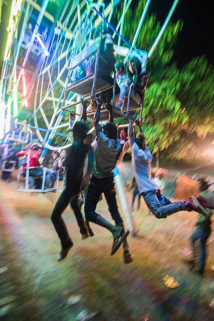 Hand operated ferris wheel at Pindaya Cave Festival, Shan State, Myanmar