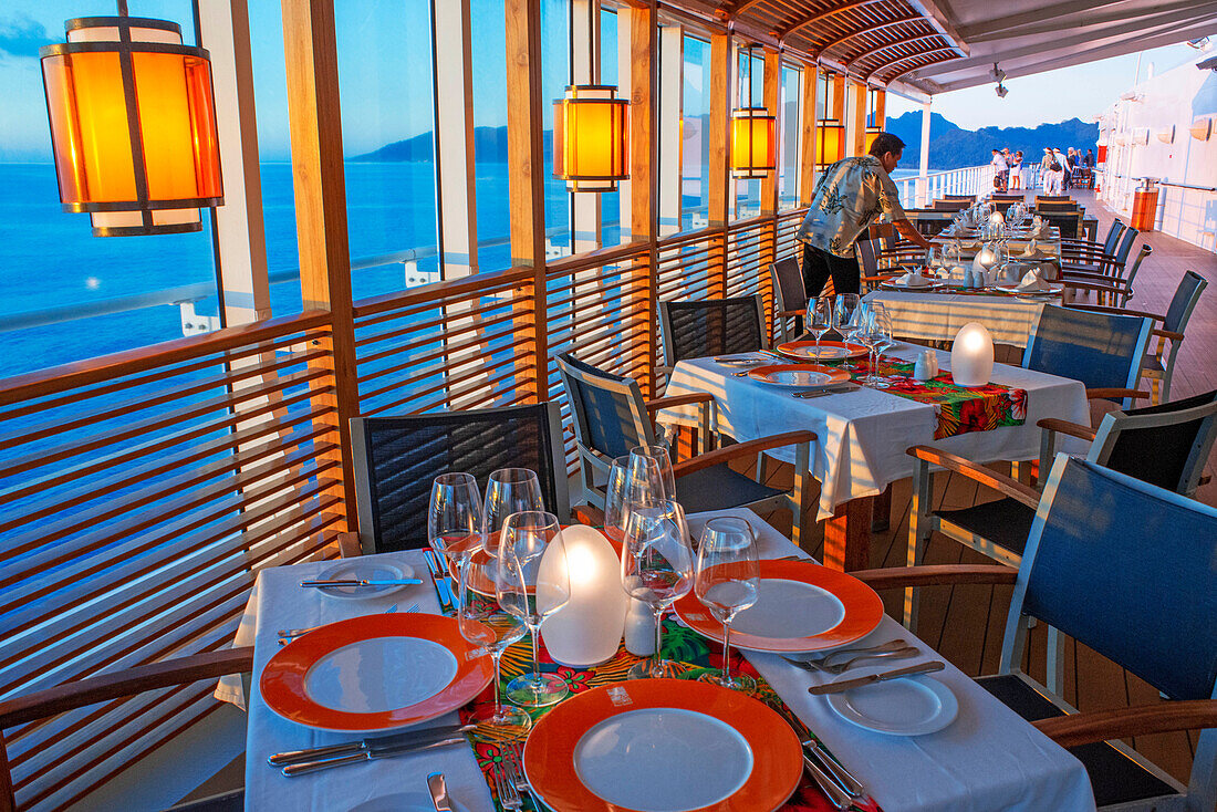 Restaurant in the luxury Paul Gauguin cruise, Society Islands, Tuamotus Archipelago, French Polynesia, South Pacific.