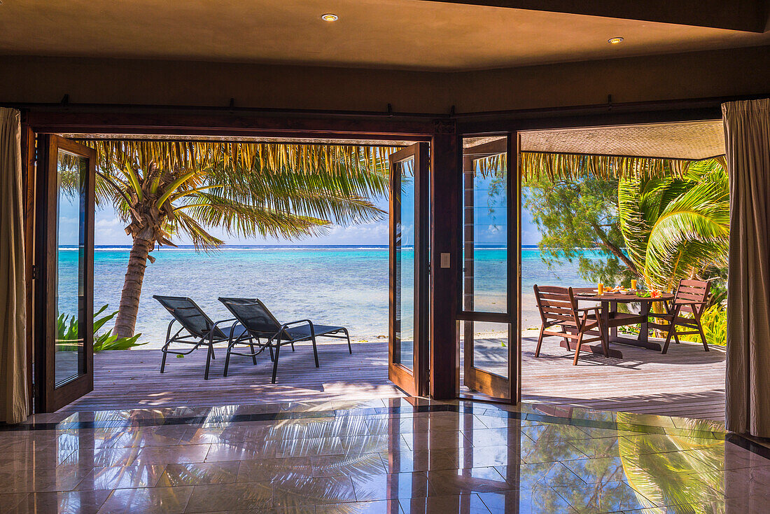 Luxury Villa accommodation with sea views of the tropical Pacific ocean and palm trees, Muri, Rarotonga, Cook Islands