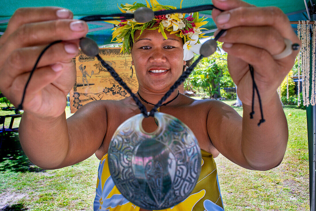 Local woman selling crafs in Fakarava, Tuamotus Archipelago French Polynesia, Tuamotu Islands, South Pacific.