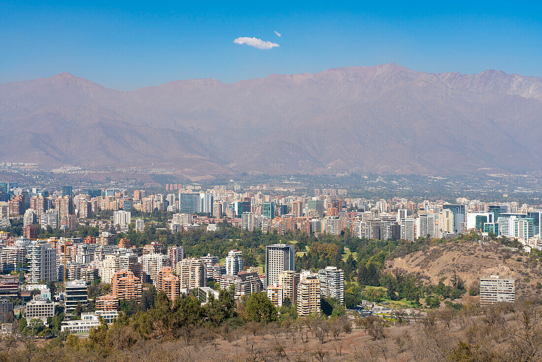 Vitacura and El Golf neighborhoods seen from San Cristobal Hill (Metropolitan Park) with Andes in background, Santiago Metropolitan Region, Chile, South America