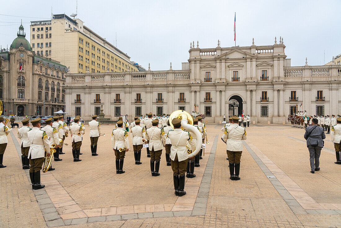 Policemen performing changing of guards ceremony in front of La Moneda Palace, Santiago, Santiago Metropolitan Region, Chile, South America