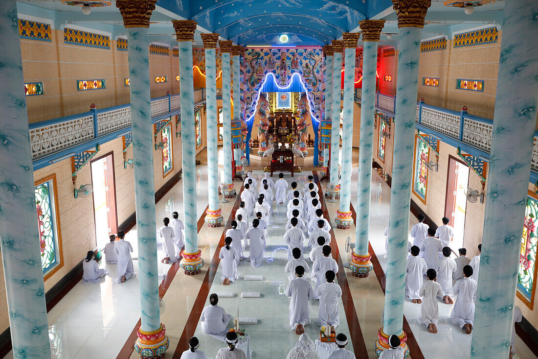 Cao Dai temple, Caodaist worshippers at ceremony, Tan Chau, Vietnam, Indochina, Southeast Asia, Asia