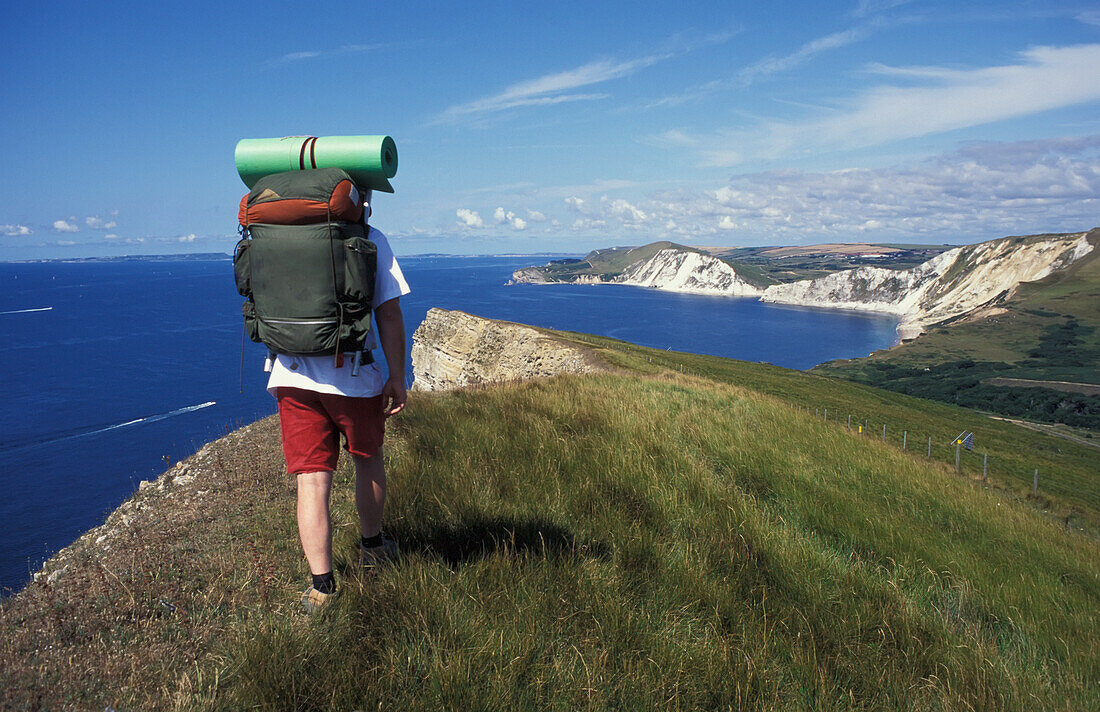 Hiker Walking Towards Worbarrow Bay