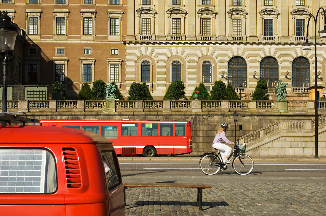 Woman Riding Past The Stockholm Palace.