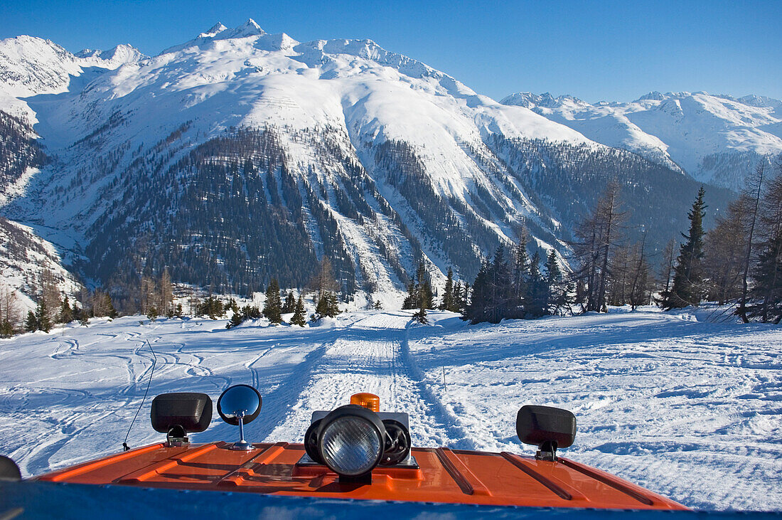View Of Mountains From Snow Vehicle.