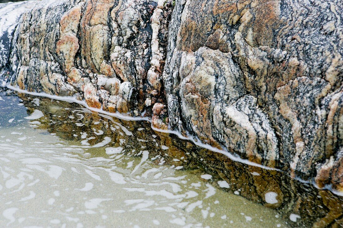 Lose-Up Of Gneiss Rock Sunken In Water