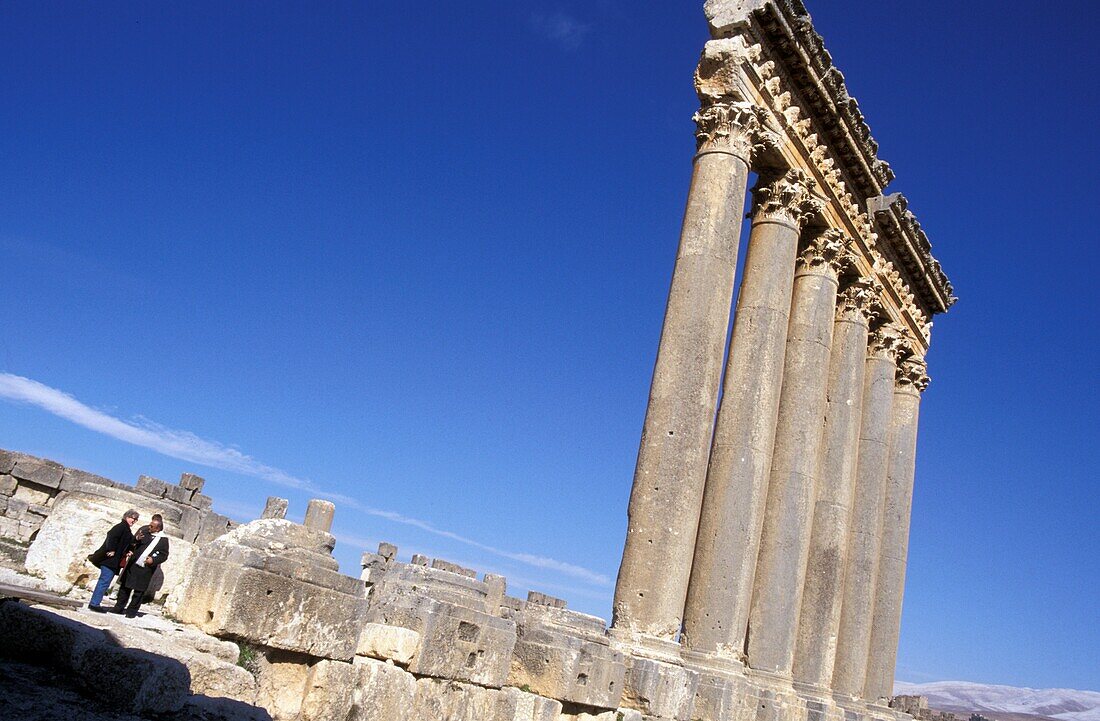 Tourists Looking At Ruins