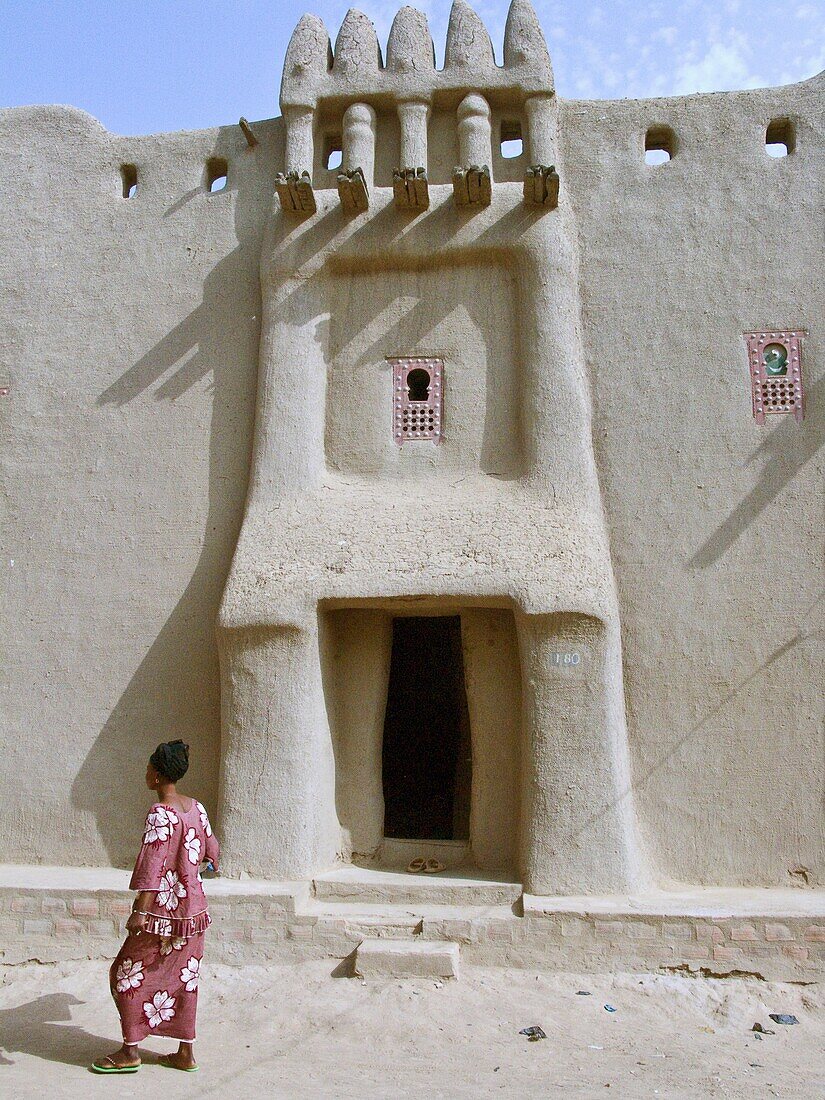 Woman Standing Outside Tukulor House