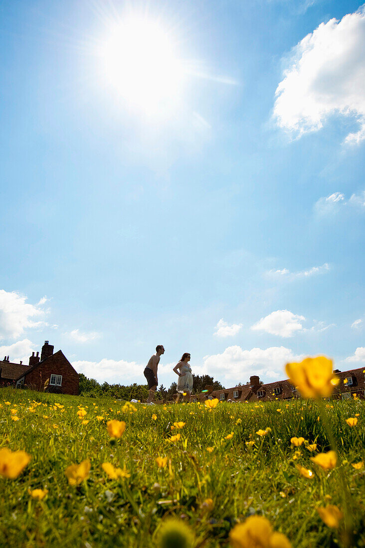 Couple And Flowers In The Shipbuilding Village Of Buckler's Hard, New Forest National Park