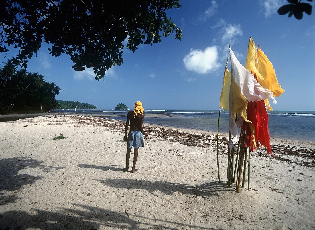 Young Local Man Beside Prayer Flags