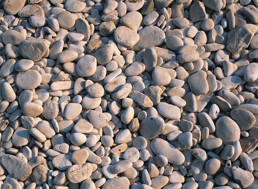 Pebbles On Beach On The South Coast Of Vis, Croatia.