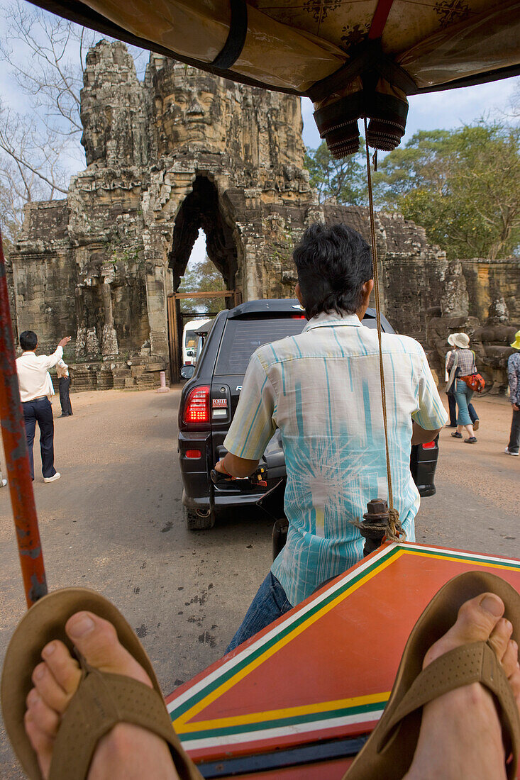 Rickshaw And Car By Bayon Temple, Angkor,Siem Reap,Cambodia