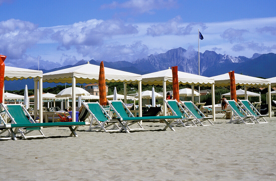 Sun Loungers And Gazeboes On Beach