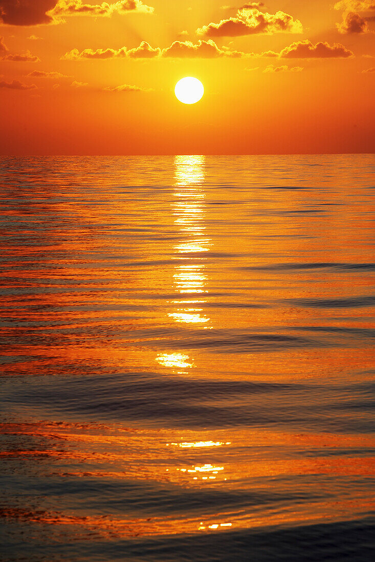 Sunset Over Ocean Horizon