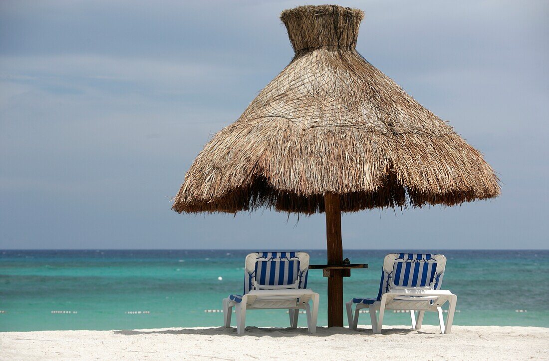 Sun Loungers And Thatched Umbrella At Beach, Mayan Riviera,Quintana Roo State,Yucatan Peninsular,Mexico
