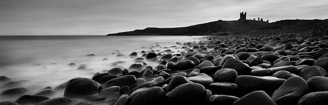 Embleton Bay With Dunstanburgh Castle In Distance, Northumberland,England,Uk