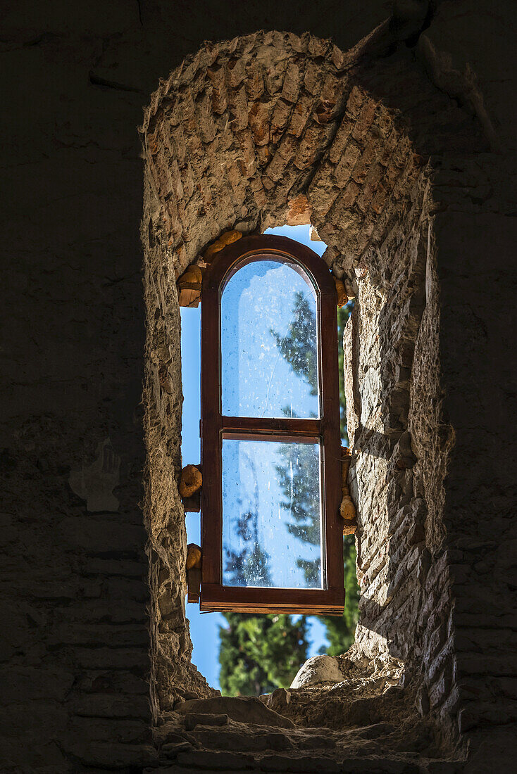 Close View Of A Glass Window In The Ancient Wall Of Ikalto Monastery; Kakheti Region, Georgia