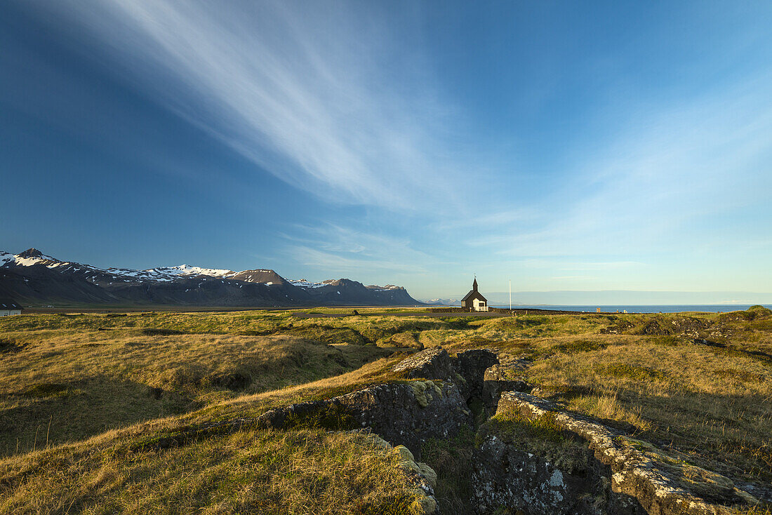 Church on lava fields at dusk, Snaefellsnes Peninsula; Budir, Iceland