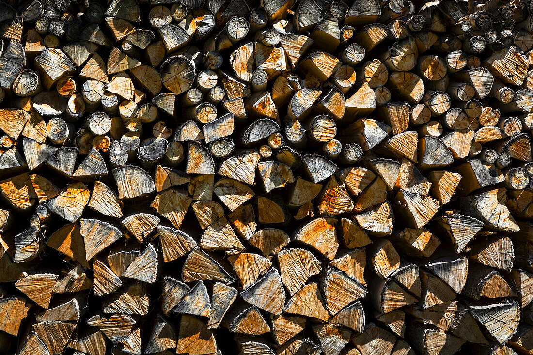 Close-up of stacked firewood at village of Praz de Fort; Praz de Fort, Val Ferret, Switzerland