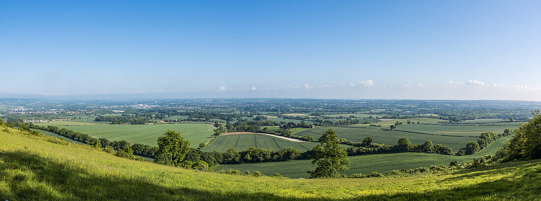Lush green fields of farmland with blue sky and horizon in the distance; Meopham, Kent, Croatia