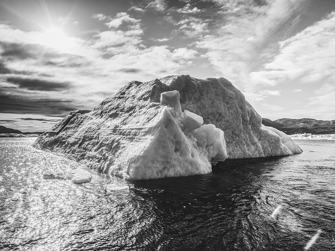 Iceberg in water off the coastline of Greenland; Sermersooq, Greenland