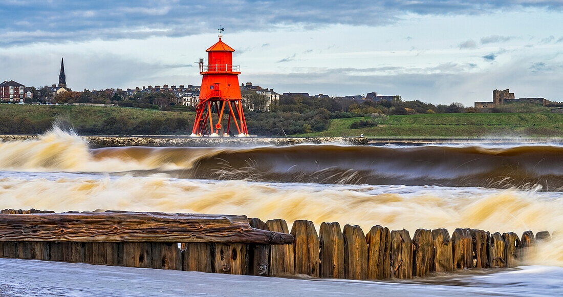 Herd Groyne Lighthouse and seaplane ramp from WWI along the shoreline of the River Tyne; South Shields, Tyne and Wear, England, United Kingdom
