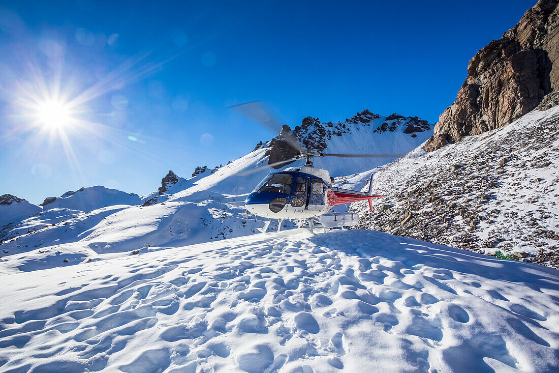 A helicopter tour provides stunning views over the Mount Cook glacier and surrounding mountaintops, Mount Cook National Park; Canterbury, New Zealand