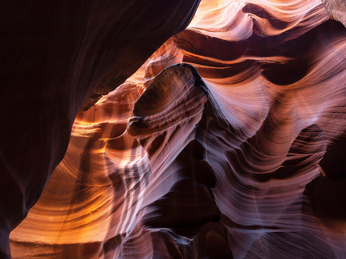 A slot canyon outside of Page, Arizona. Beautiful colours and sandstone caused by eons of wind and water erosion; Page, Arizona, United States of America