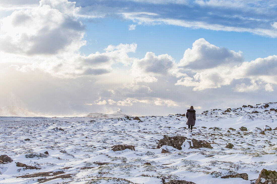 An afternoon exploring the vast snowy rugged terrain of Iceland in the wintertime; Iceland