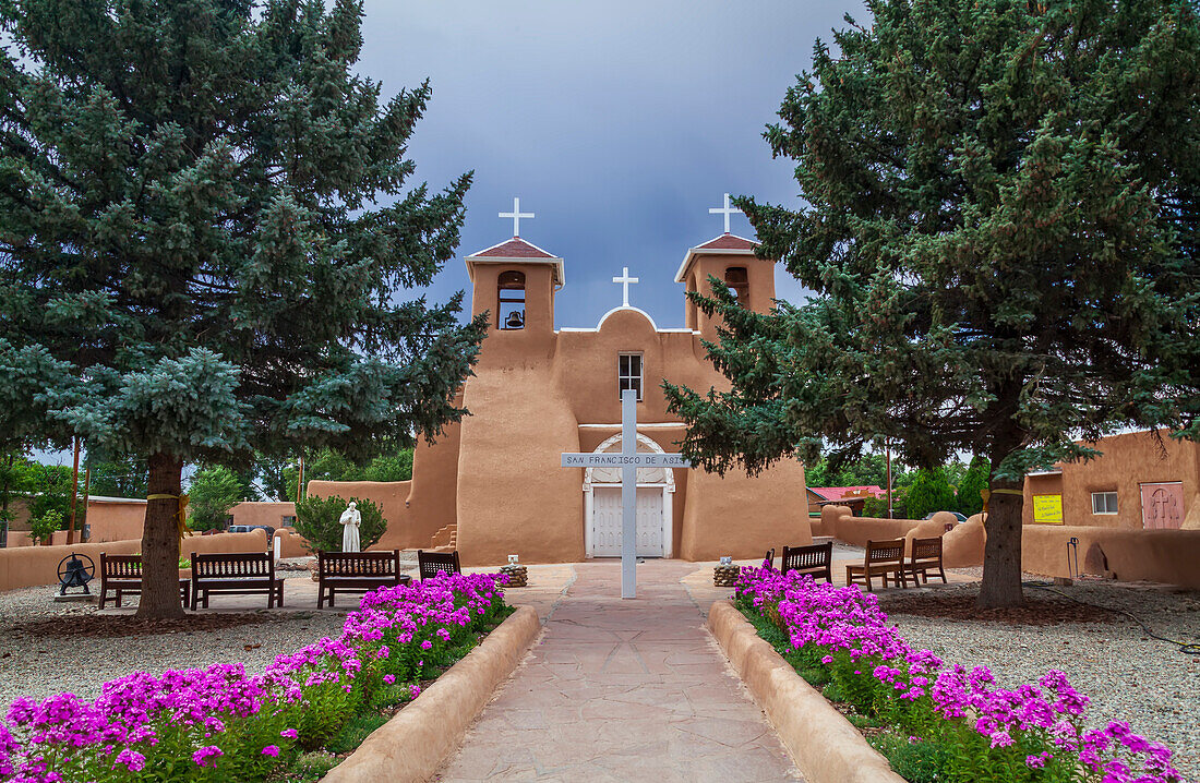 Facade of the historic San Francisco de Asis Church on the main plaza of Ranchos de Taos; Taos, New Mexico, United States of America