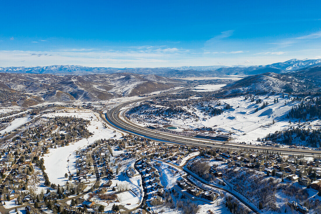 Aerial View over Park City after a winter snowfall, famous for its ski resorts and ; Park City, Summit County, Utah, United States of America