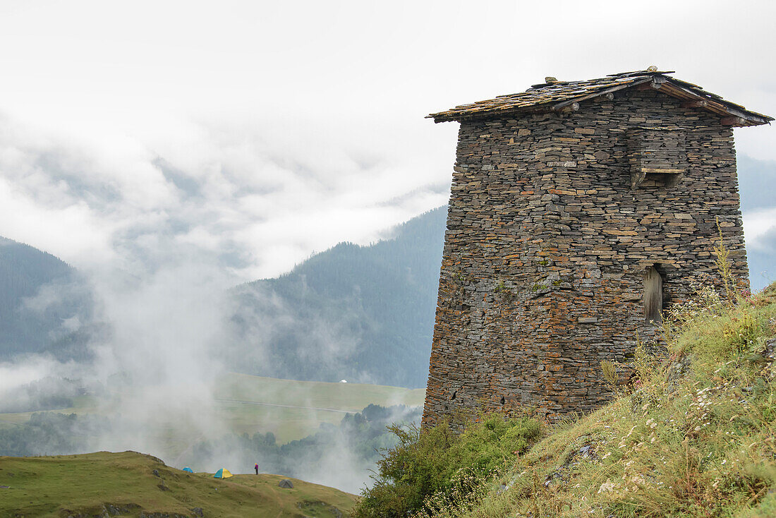 Close-up of a tower house at the mountaintop medieval fortress of Keselo overlooking the village of Omalo in the Tusheti National Park; Omalo, Kakheti, Georgia