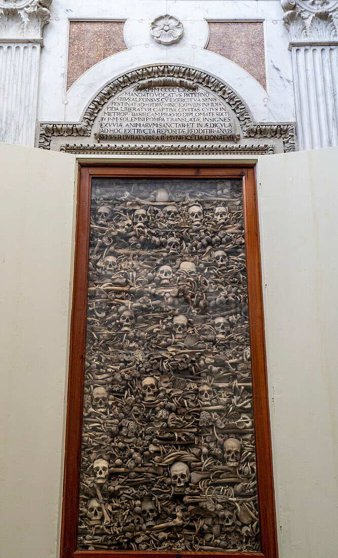 Close-up of the glass case crypts in the walls at the Chapel of the Martyrs containing the remains of Otranto citizen martyrs inside the Cathedral of Saint Mary of the Announcement; Otranto, Puglia, Italy