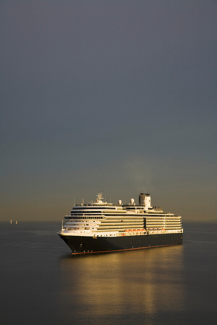 A Cruise Ship In Tranquil Water At Dawn; Saint Petersburg, Russia