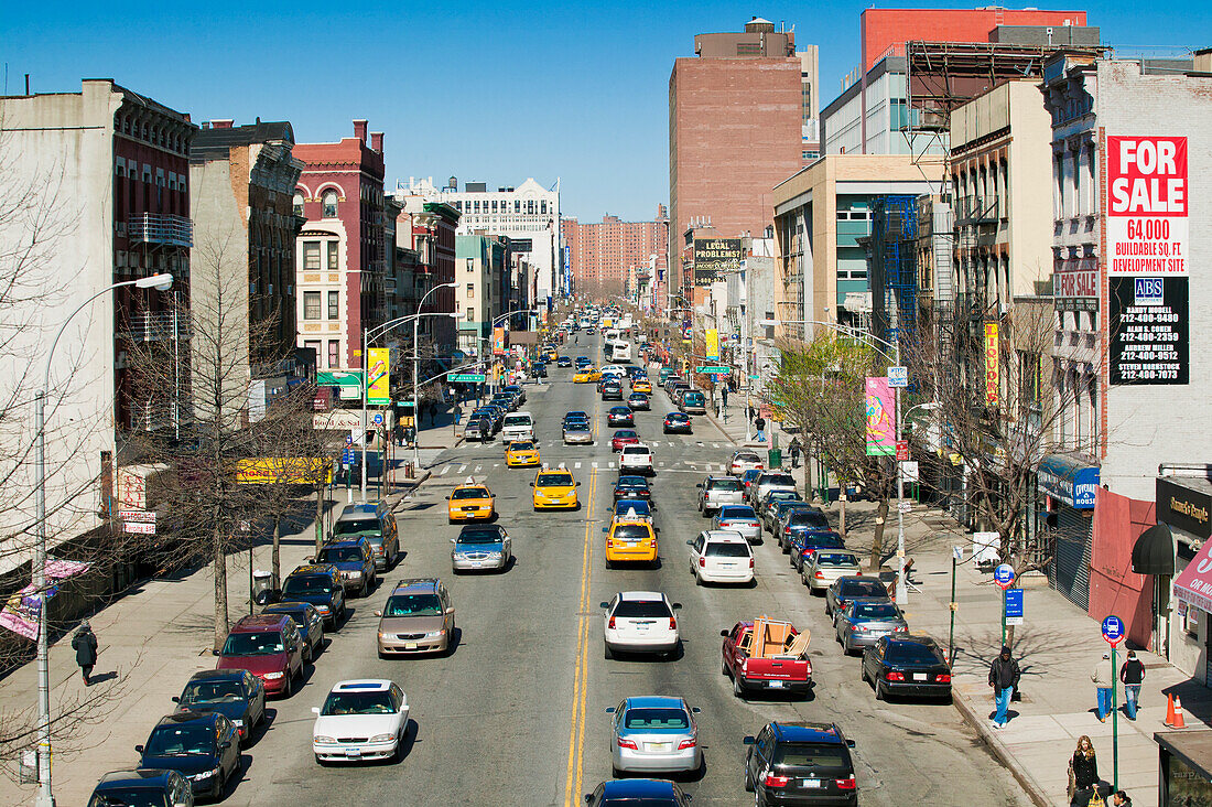 Traffic On 125 Street In Harlem; New York City, New York, United States Of America