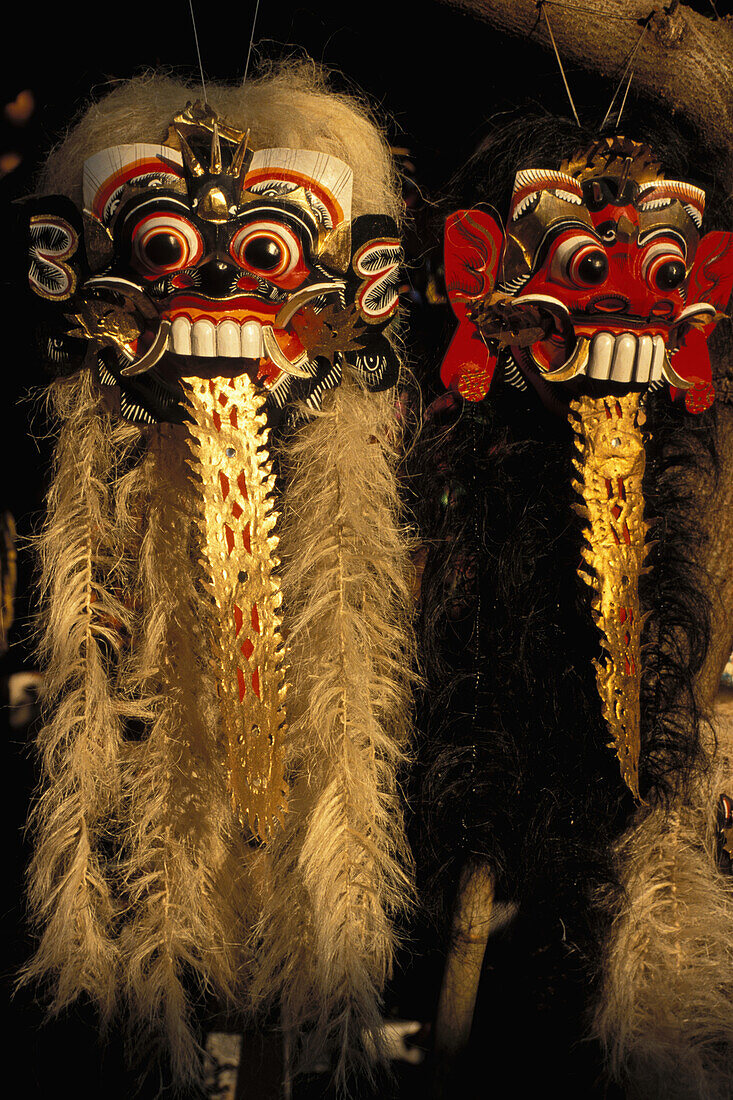 Indonesia, Bali, Closeup Of Barong Dance Masks Hanging
