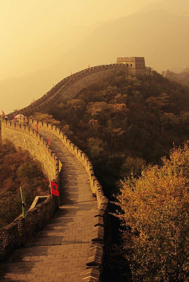 China, Mu Tian Yu, The Great Wall With Misty Yellow Sky, Flags Along Wall