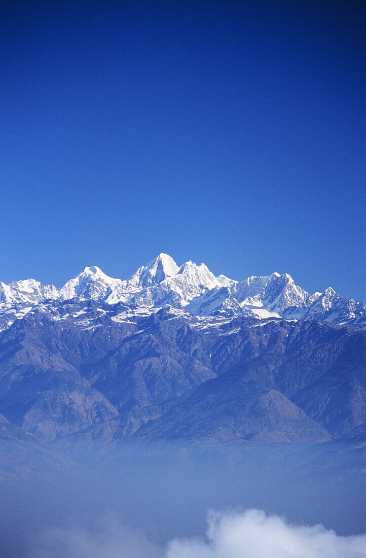 Nepal, Snowcapped central Himalayas above cloud line; Nagarkot