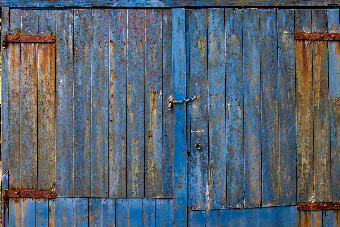 The Side Of A Weathered Building Painted Blue; Argyll Scotland