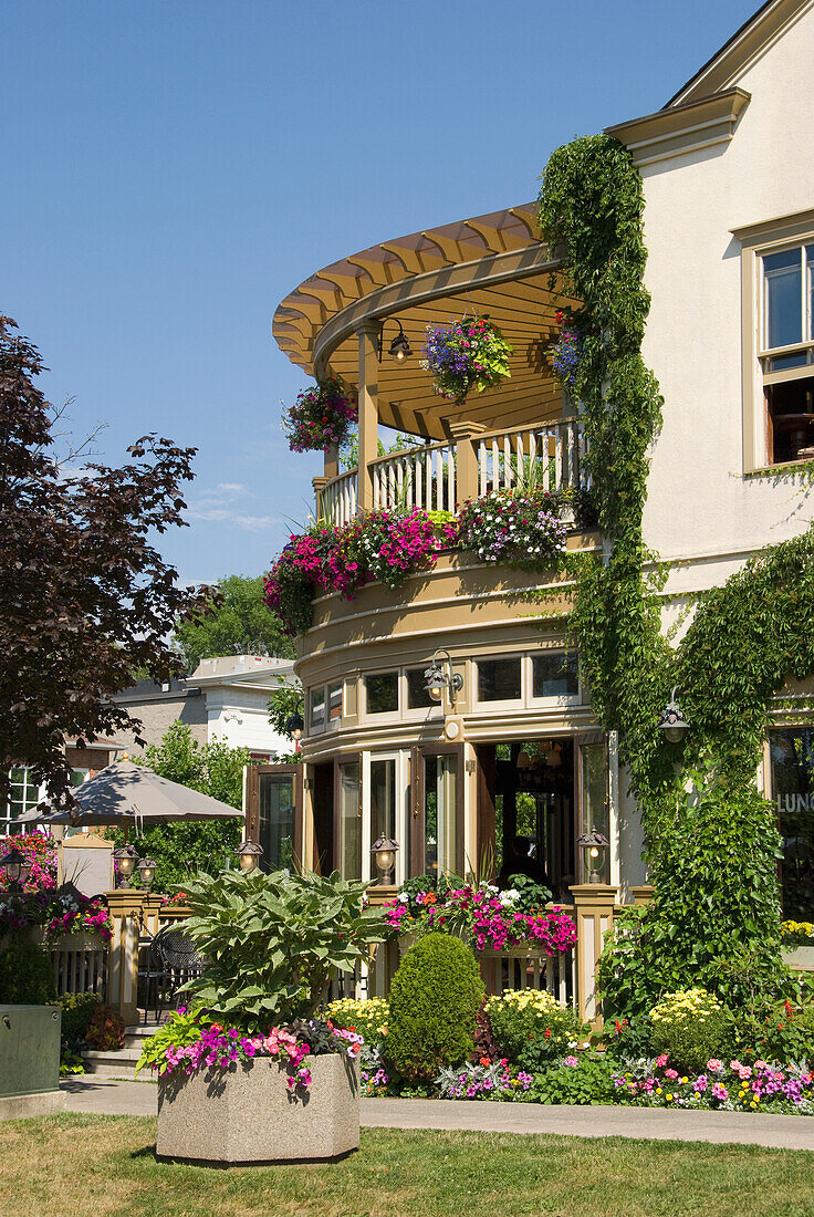 A Building With Vines And Flower Pots; Niagara On The Lake Ontario Canada