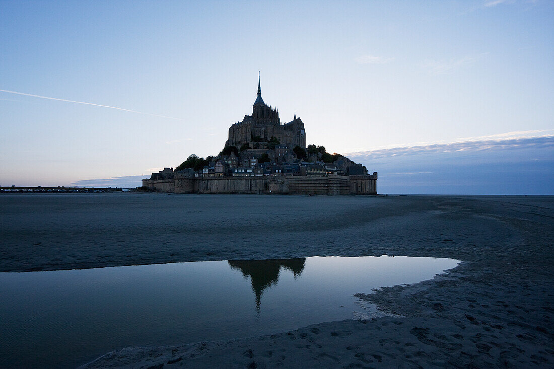 Mont-Saint-Michel And Mudflats In The Bay At Dusk, As Seen From The East, France